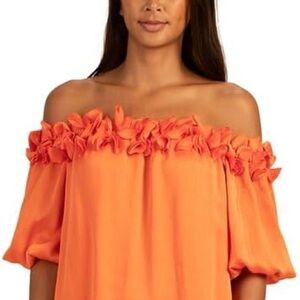 Trina Turk off the should bright orange dress. Retail $328